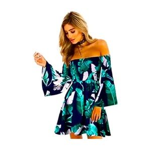 Tropical dress flowy and flirty fits Large and Medium